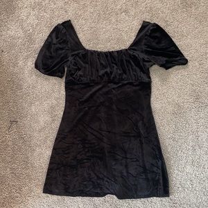 Divided black velvet babydoll dress